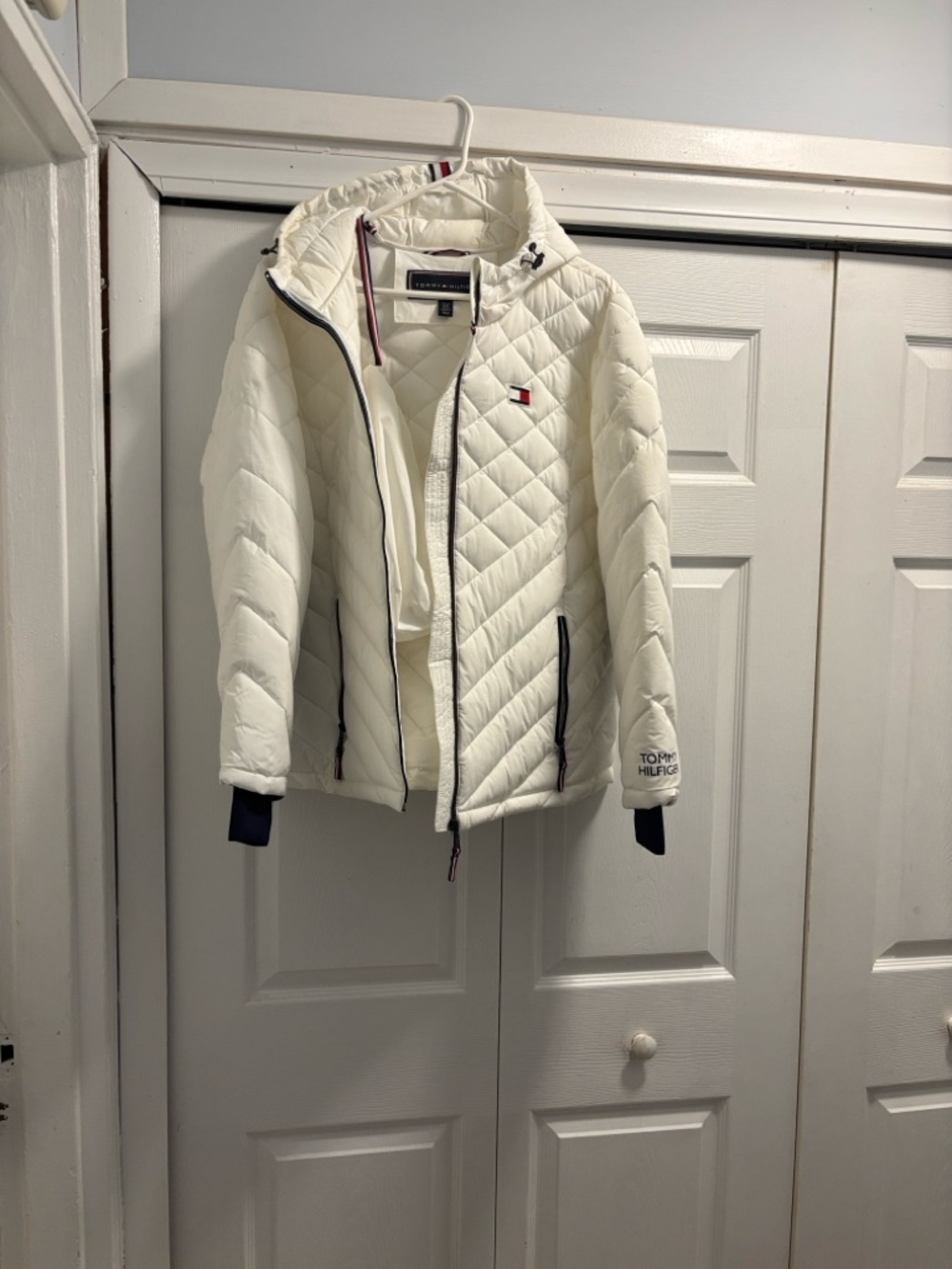 Tommy Hilfiger White Quilted Jacket with Red and Black Flag Logo